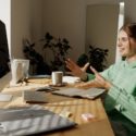 Woman talking to computer, representing Sexual Education and Porn Use in Women