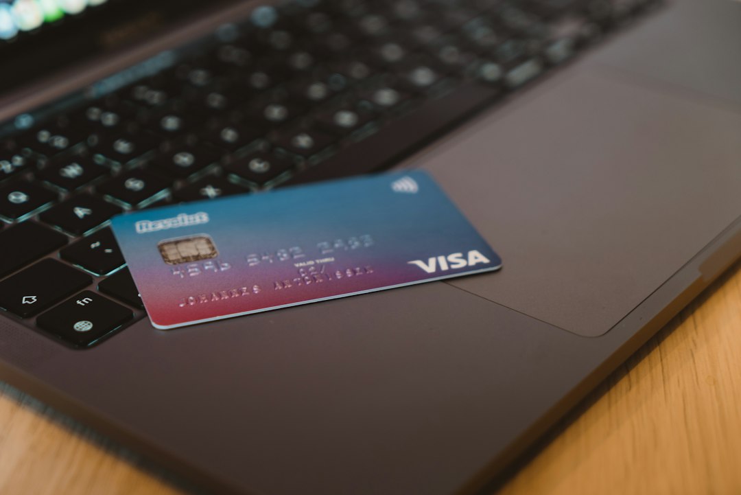 Revolut debit card on a laptop keyboard, illustrating the Revolut data breach.