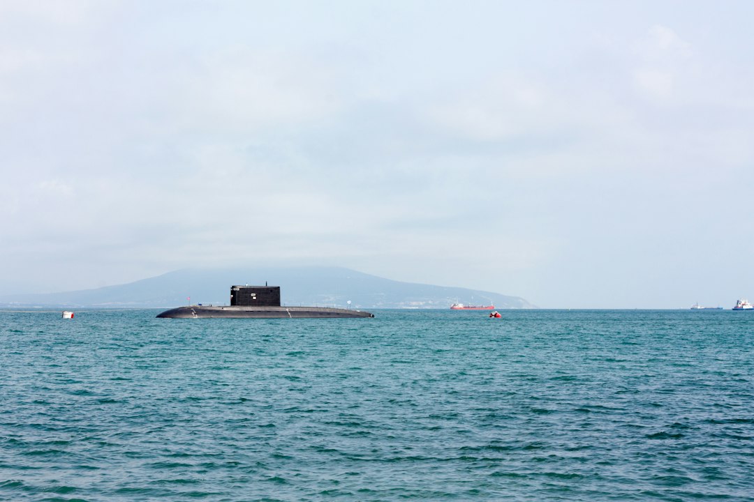 Submarine at sea, illustrating security concerns around Arctic undersea cables.