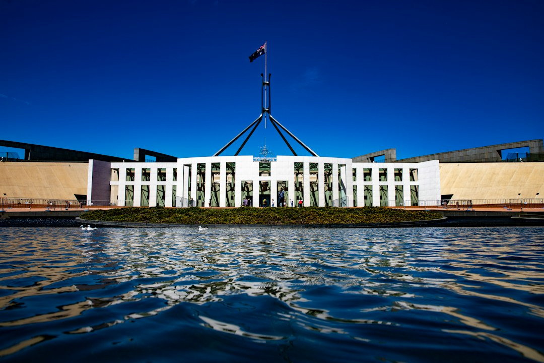 Australian Parliament House, illustrating an Australian government portal incident involving an OpenAI agent.