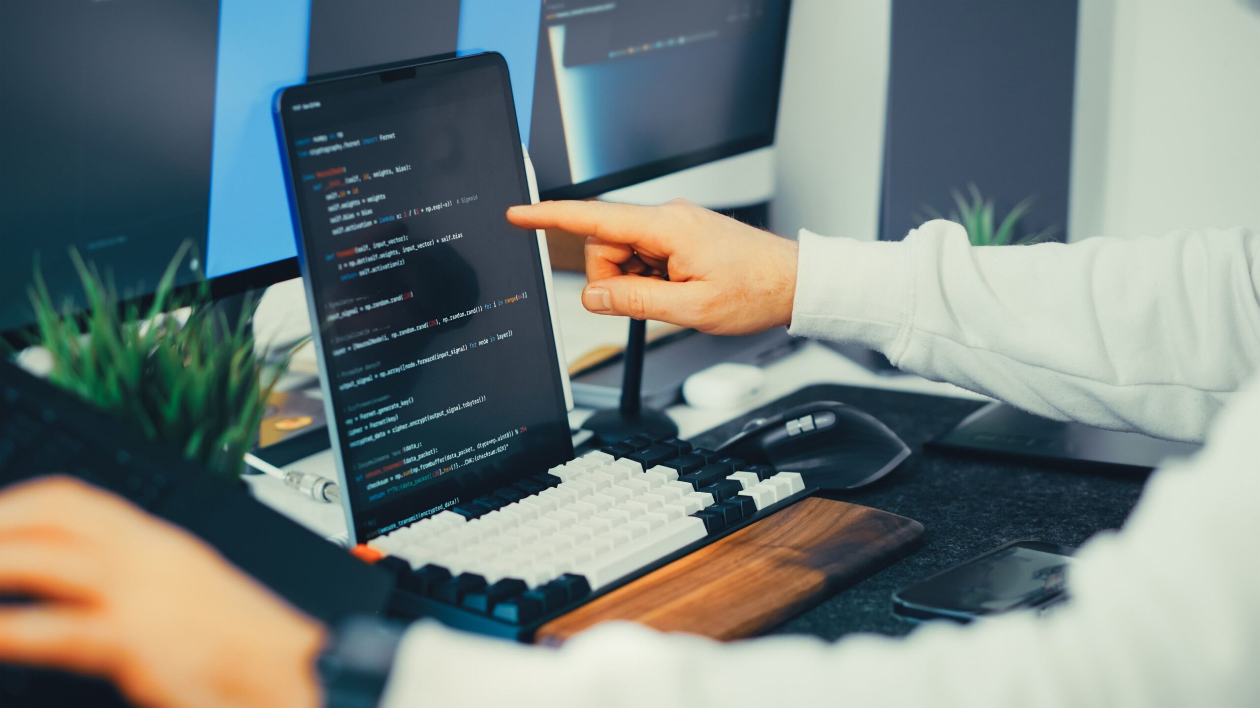 Programmer at a laptop, illustrating the PHP security update.